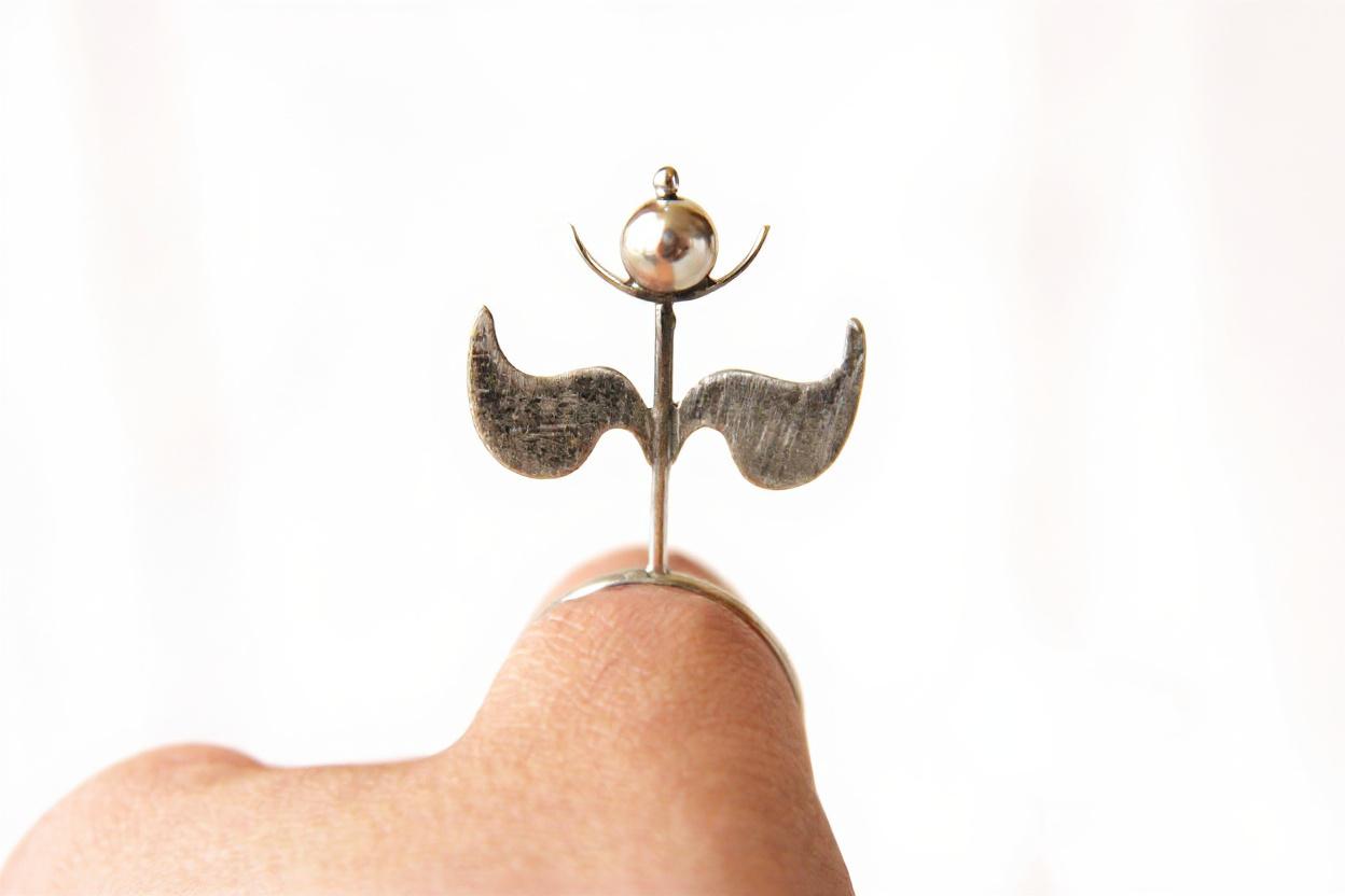 Oxidized silver ring from the ASSOCIATION project featuring Sasanian-inspired motifs