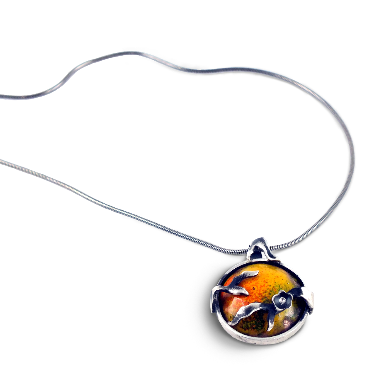 Nature-inspired jewelry with intense enamel colors and silver