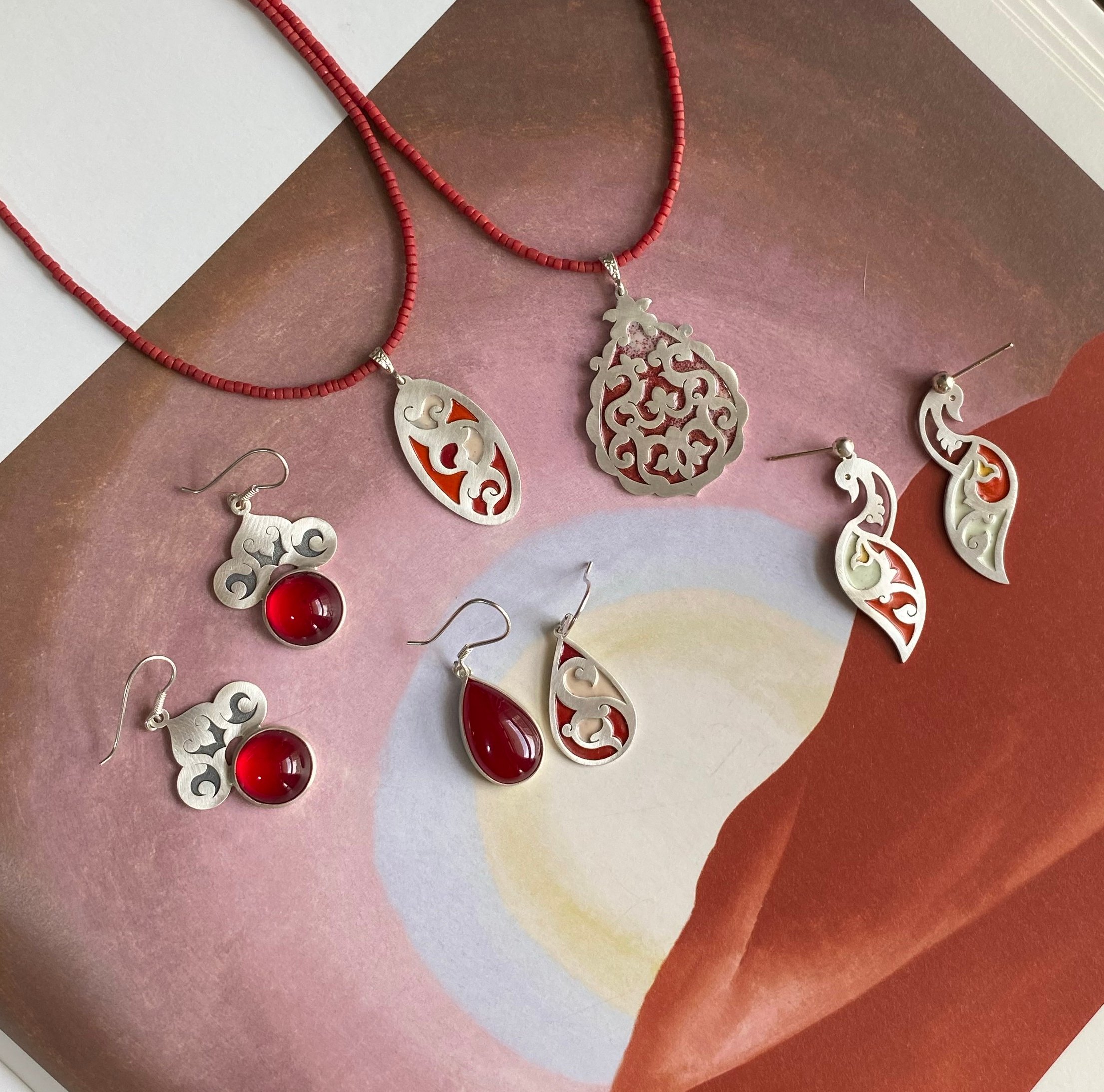 Handmade Persian carpet-inspired jewelry with exclusive patterns