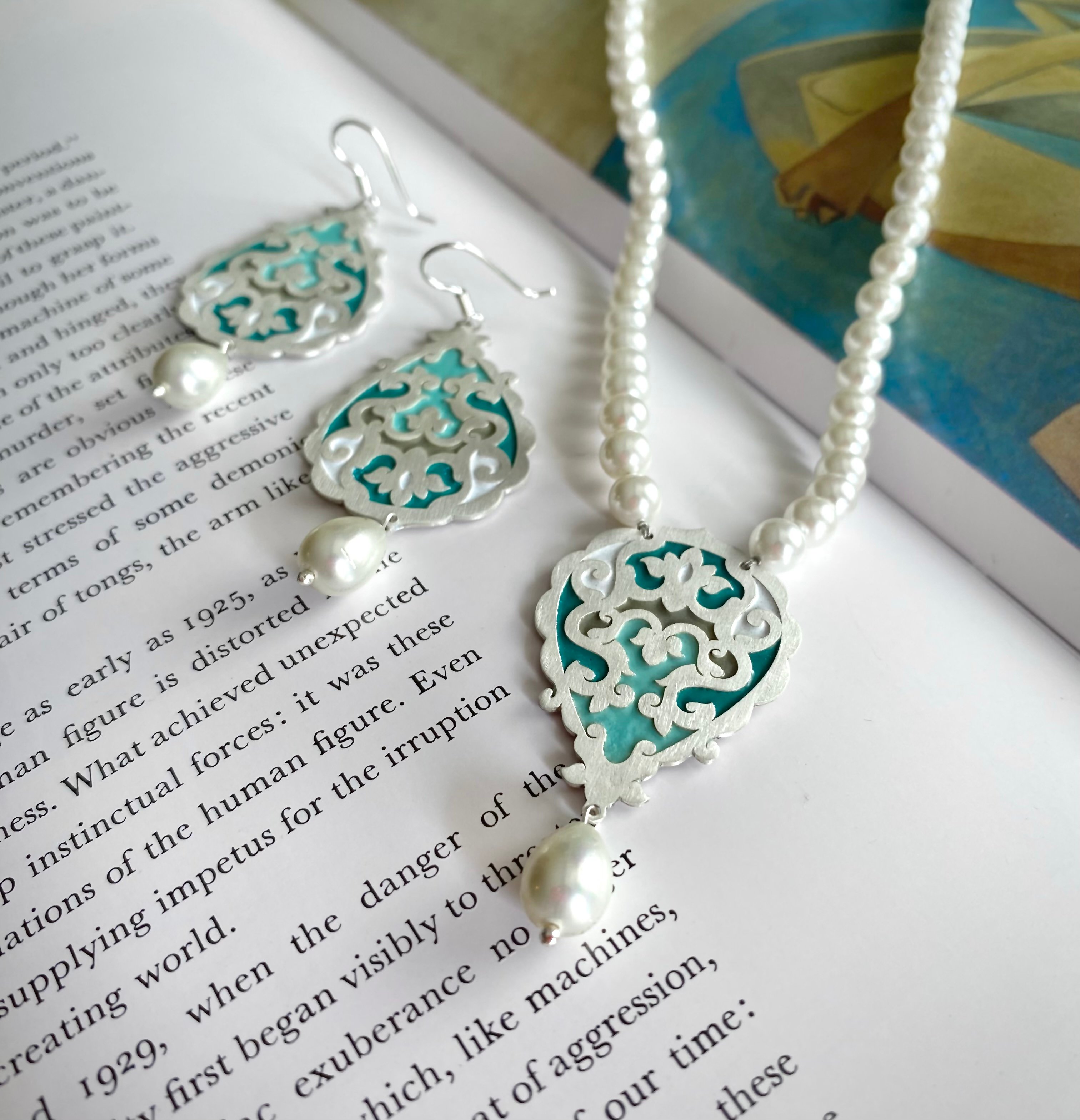 Persian enamel jewelry featuring colors from nature and traditional techniques